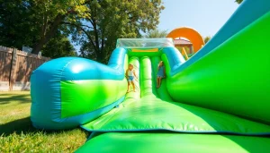 Kids enjoying an inflatable slip and slide, splashing water joyfully in a backyard setting.