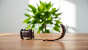 Showcase of a premium leather watch band with intricate details on a minimalist wooden surface.
